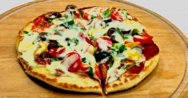 طريقة عمل البيتزا السريعة بيدون فرن