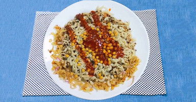 الكشري المصري البيت بالصلصة والدقة