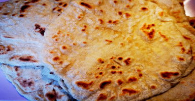 طريقة عمل الخبز العربي في البيت من غير فرن